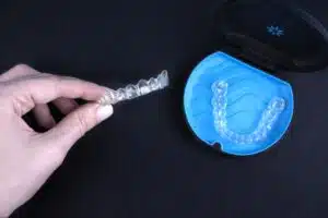 Invisalign Teen aligners stored in a protective case