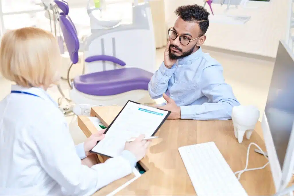 Patient discussing switching orthodontic treatment options with an orthodontist
